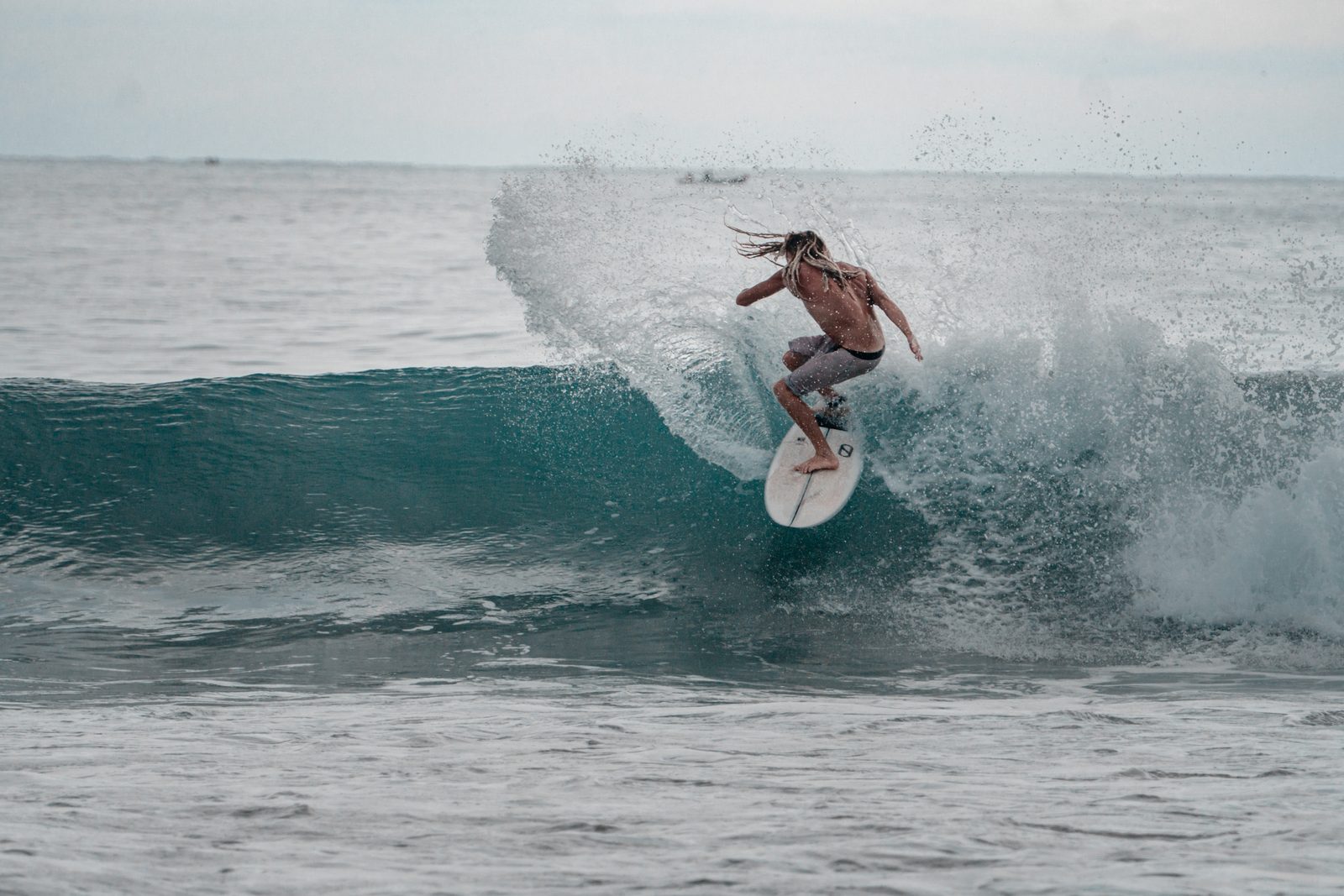 Surfer going off the lip